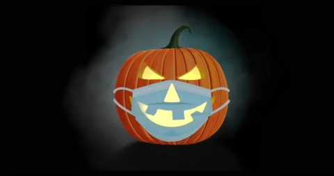 Spooky Halloween Jack-o'-Lantern with Pandemic Face Mask Stock Footage 142104121