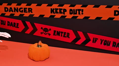 Spooky Halloween Magic: Skeleton Hand Places and Takes Pumpkin Stock Footage 251652704