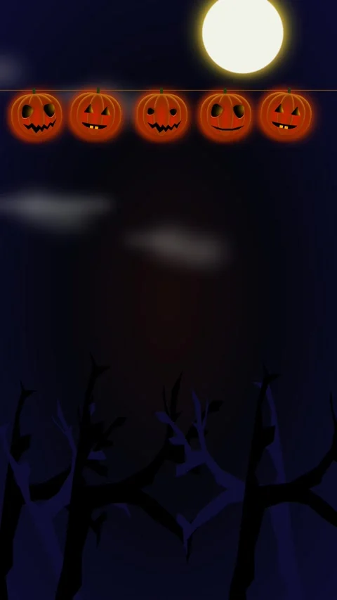 Spooky Halloween vertical video background with full moon and glowing pumpkins Stock Footage 339314289