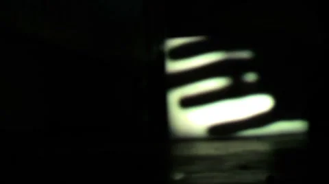 Spooky Hand Shadow on Screen Stock Footage 8687094