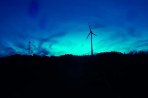 Spooky horror modern windmill establishing shot creepy blue tint, click for HD Stock Footage 43917159