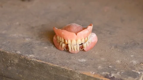 Spooky shaking old denture Stock Footage 88919041