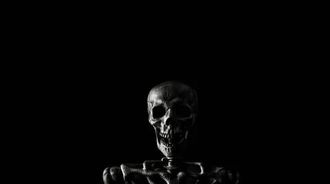 Spooky skeleton approaches and opens eyes Stock Footage 66577444