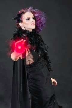 Spooky witch casting magic energy Foto stock
