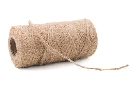 Spool of beige twine or string on white background Stock Photos