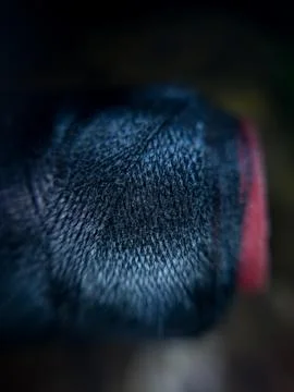 Spool of black sewing thread Stock Photos