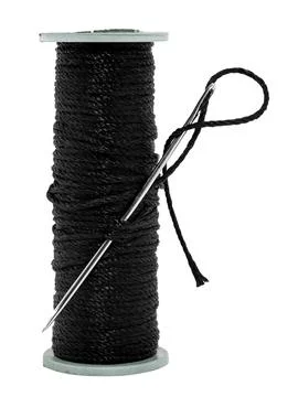 A spool of black thread and a needle on a white background. Synthetic threa.. Stock Photos