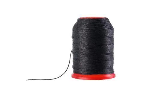 Spool of black thread  isolated with clipping path. Foto stock