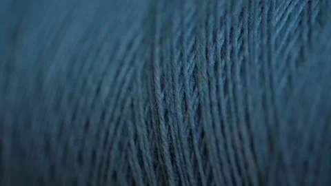 Spool of blue cotton thread for sewing macro 動画素材 281590431