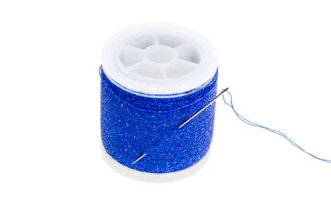 Spool of Blue Thread on a White Background Stock Photos