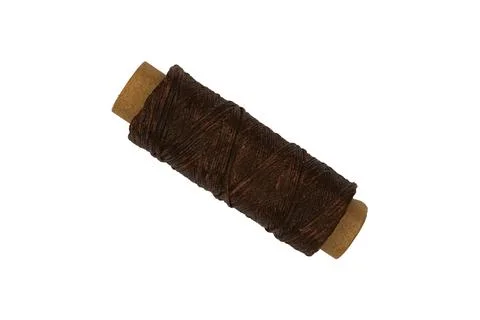 Spool with brown threads isolated on transparent background. Foto stock