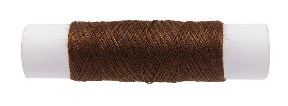 Spool of colored thread on a white isolated Foto stock