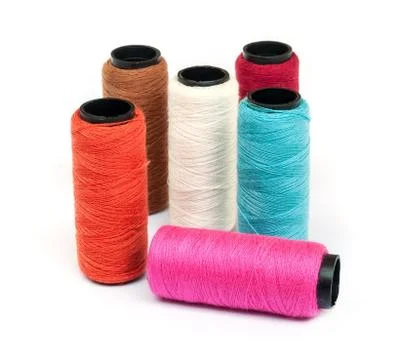 Spool of coloured  thread . Fotos de archivo