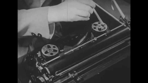 The spool cover is removed, the shift lock key is pressed, the ribbon indicator Stock Footage 120036778