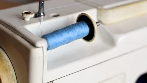 Spool of high quality blue bobbin thread Stock Footage 114112372
