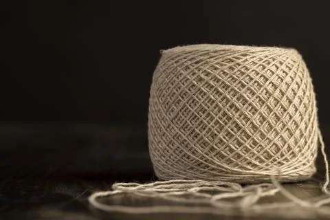 A spool of light thread for sewing 写真素材