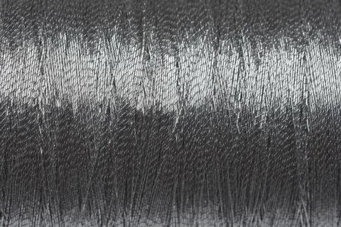 Spool of metallic thread Stock Photos