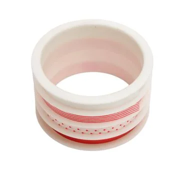 Spool of patterned washi tape on isolated white background. Decorative adhe.. Stock Photos