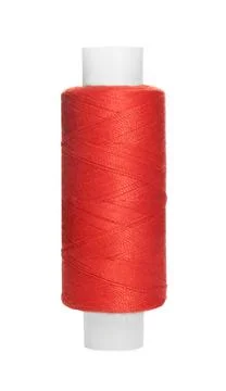 Spool of red sewing thread isolated on white Stock-Fotos