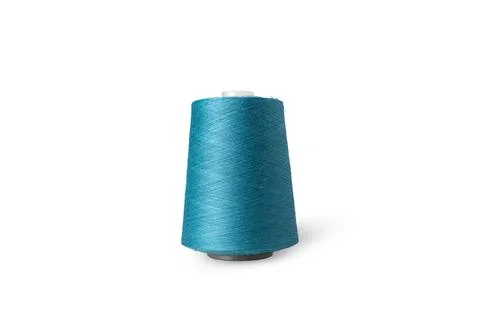Spool of sewing thread isolated on white background. Blue green thread used.. Stock Photos