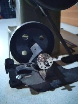 Spool of a straight stitch sewing machine Stock Photos