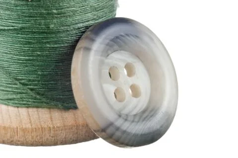 Spool of thread and buttons Stock-Fotos