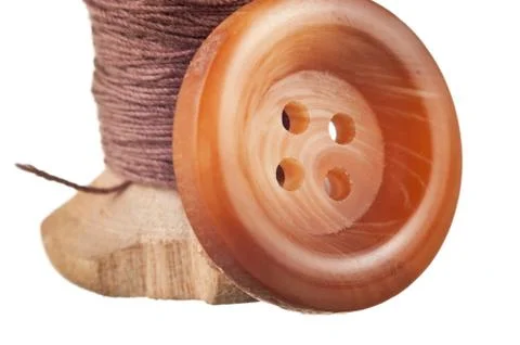 Spool of thread and buttons 스톡 사진