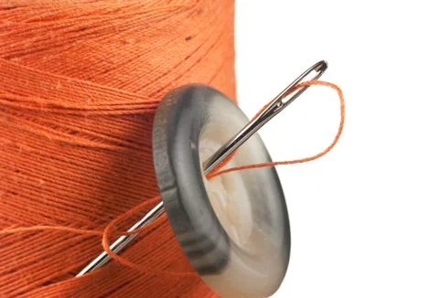 Spool of thread and buttons 스톡 사진