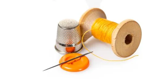 Spool of thread and buttons Foto stock