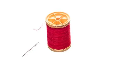 Spool of Thread and Needle Stock Photos
