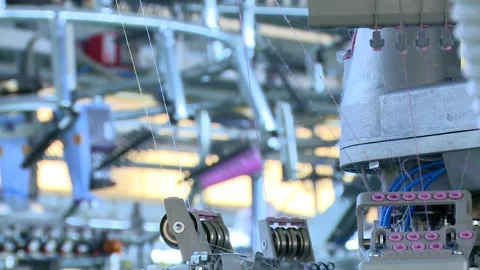 A spool of thread is attached to the equipment 1 Stock Footage 318849153