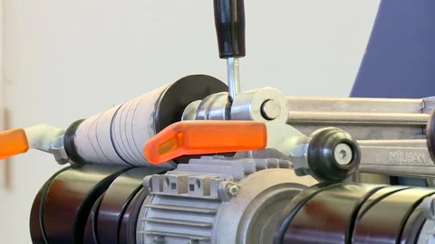 A spool of thread is attached to the equipment 2 Stock Footage 318849146