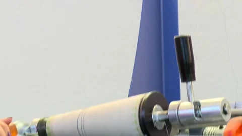 A spool of thread is attached to the equipment 4 Video stock 318849147
