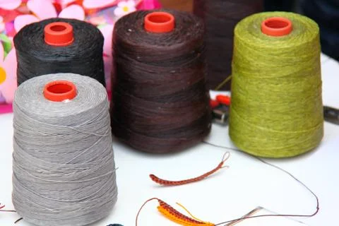 Spool of thread  on a background Stock Photos