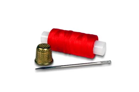 Spool of thread. needle. thimble Stock Photos