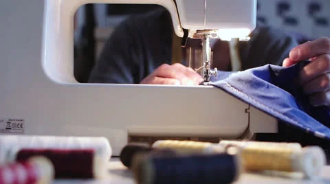 Spool of thread - sewing machine -  seamstress Stock Footage 24631739