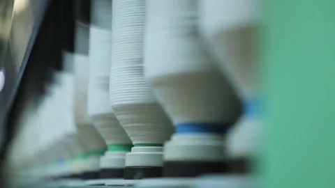 The spool of thread is spinning, focused Stock Footage 229946996