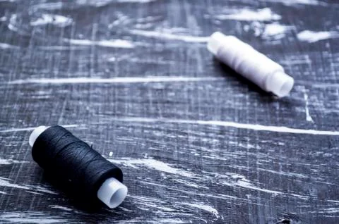 The spool of thread on the table. Thread on a reel for craft. Ma Stock Photos