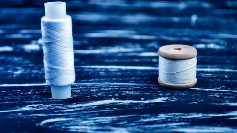 The spool of thread on the table. Thread on a reel for craft. Ma Stock Photos