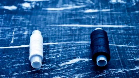 The spool of thread on the table. Thread on a reel for craft. Ma Stock Photos