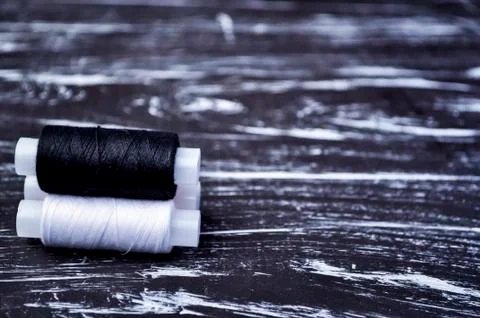 The spool of thread on the table. Thread on a reel for craft. Ma Stock Photos