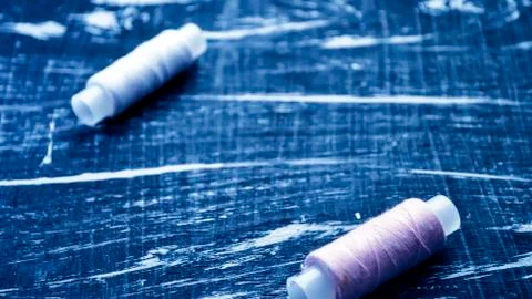 The spool of thread on the table. Thread on a reel for craft. Ma Stock Photos