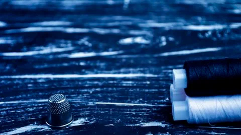 The spool of thread on the table. Thread on a reel for craft. Ma Stock Photos