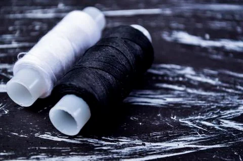 The spool of thread on the table. Thread on a reel for craft. Ma Stock Photos