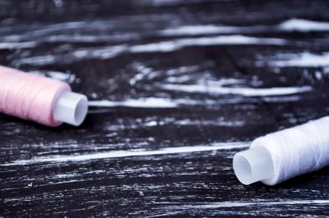 The spool of thread on the table. Thread on a reel for craft. Ma Stock Photos