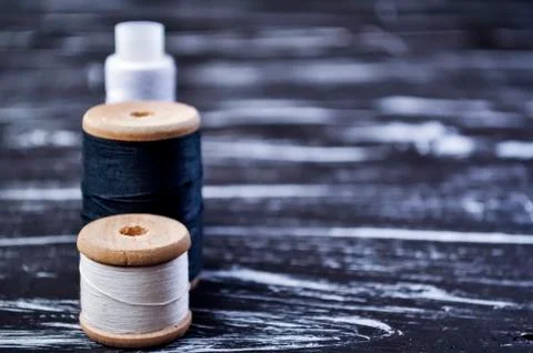 The spool of thread on the table. Thread on a reel for craft. Ma Stock Photos