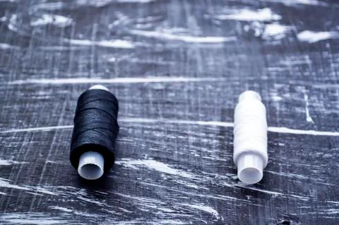 The spool of thread on the table. Thread on a reel for craft. Ma Stock Photos