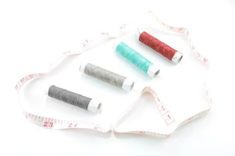 Spool of thread on white background Stock Photos