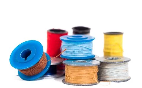 Spool of thread on white background Stock Photos