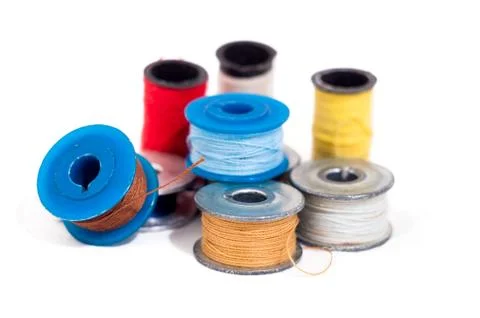 Spool of thread on white background Stock Photos